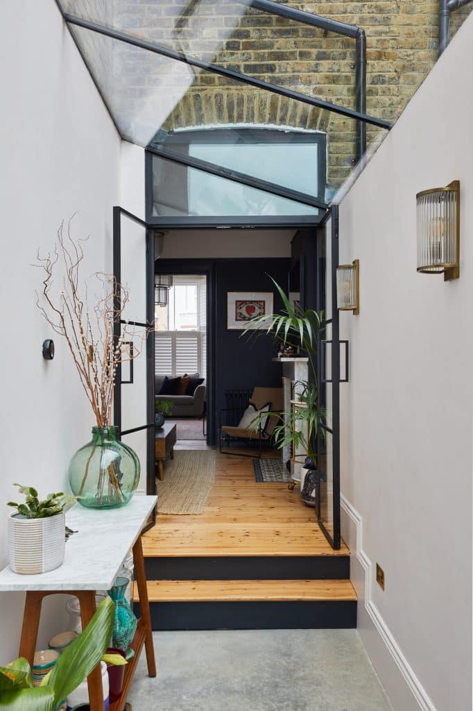 a room filled with furniture and a window