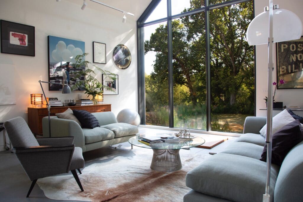 a living room filled with furniture and a fire place
