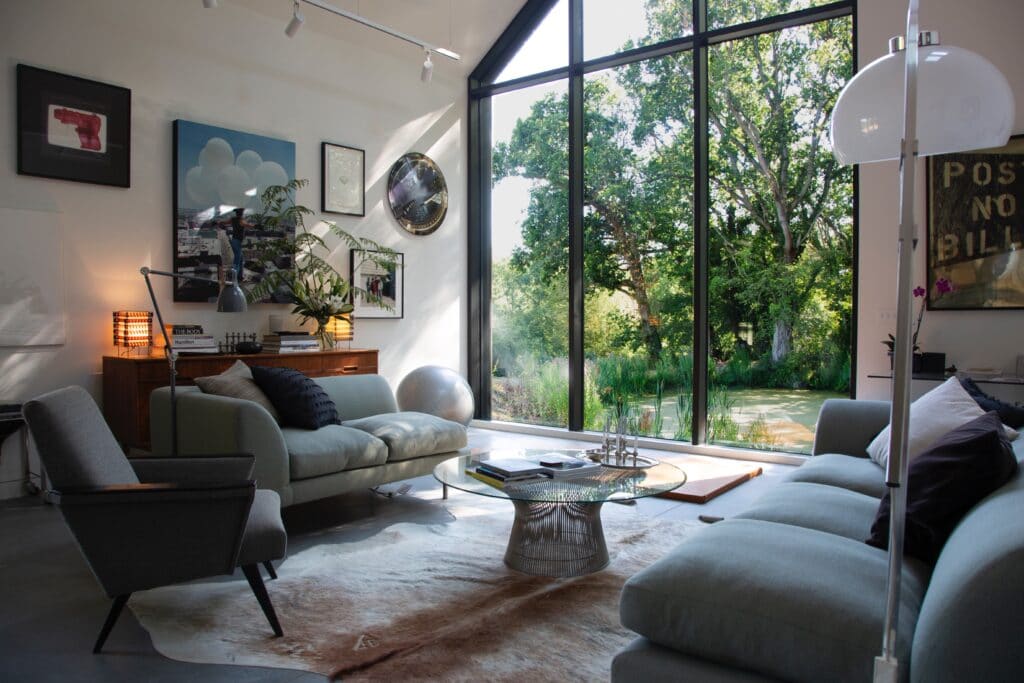 a living room filled with furniture and a fire place