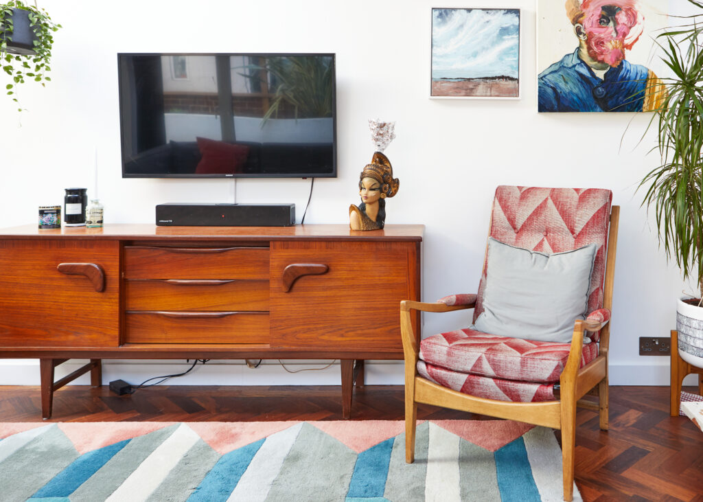 a living room filled with furniture and a fire place