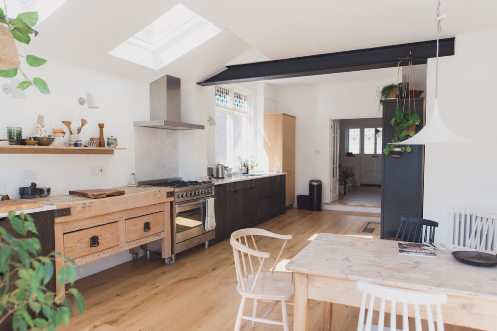 a kitchen with a dining room table