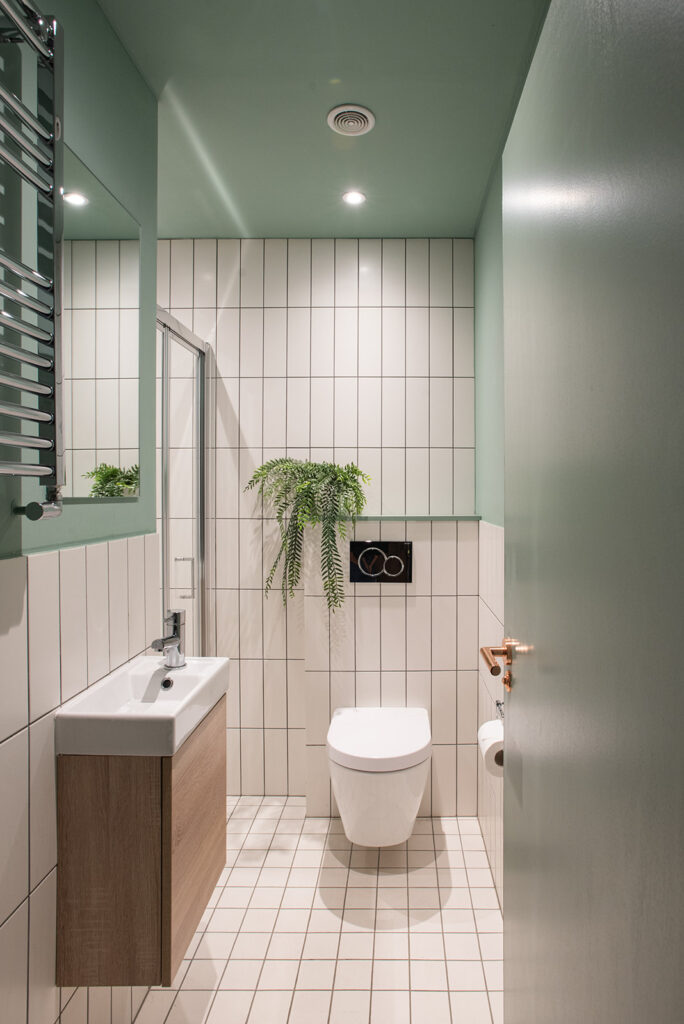 a restroom with a sink and a mirror
