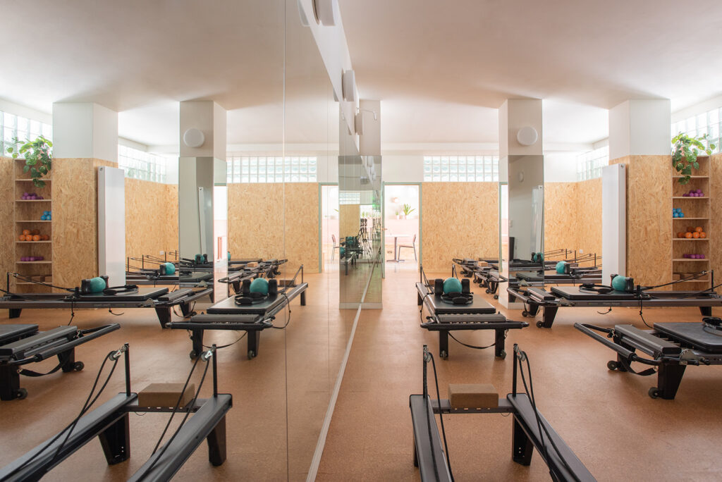 a room filled with furniture and a large window