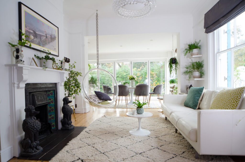 a living room filled with furniture and a fire place