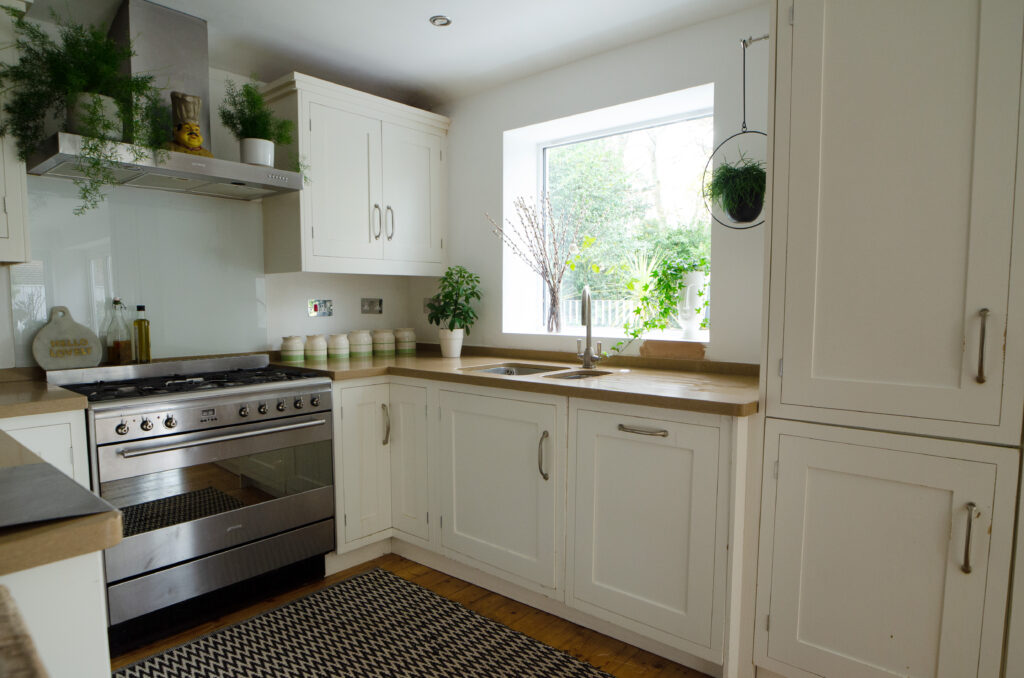 a kitchen with a sink and a window