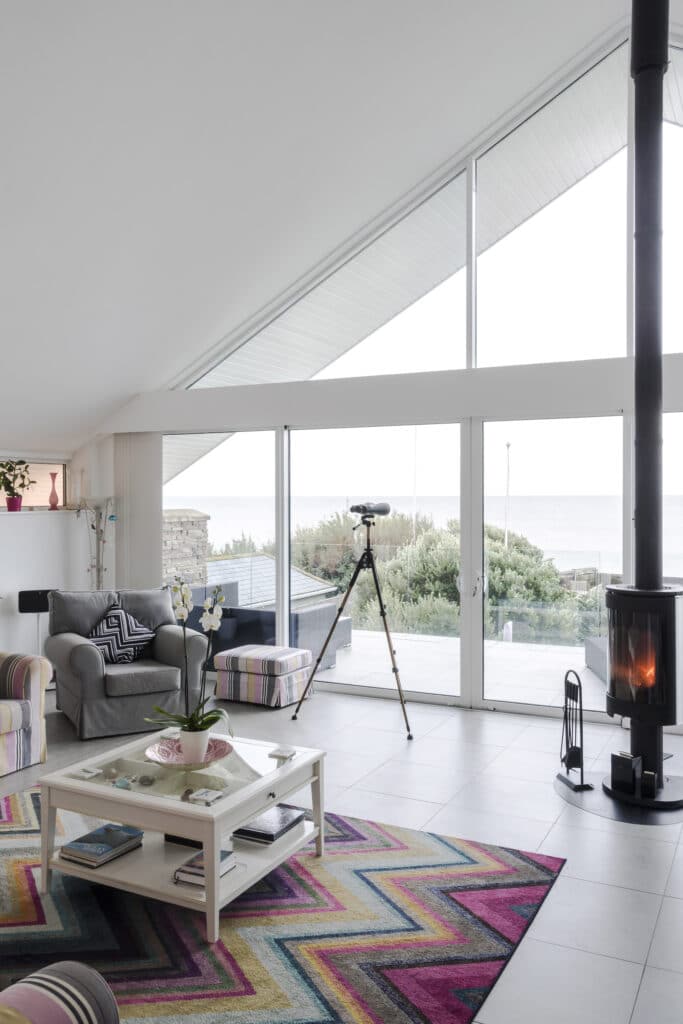 a room filled with furniture and a large window