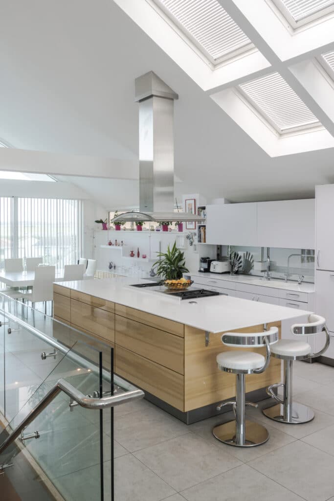 a kitchen with a table in a room