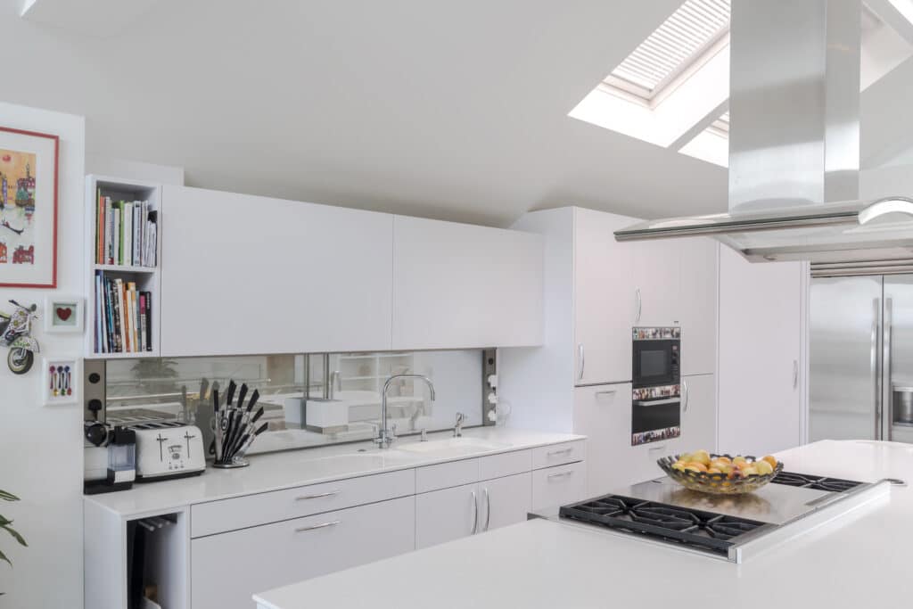 a kitchen with a table in a room