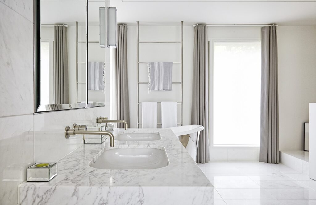 a room with a sink and a window