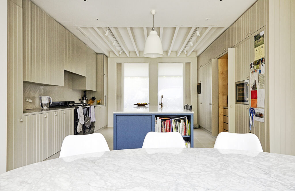 a bedroom with a bed in a room