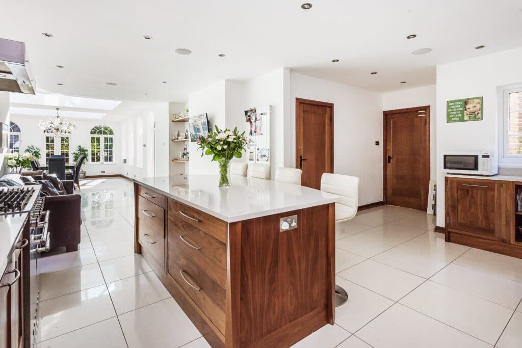 a room filled with furniture and wood cabinets