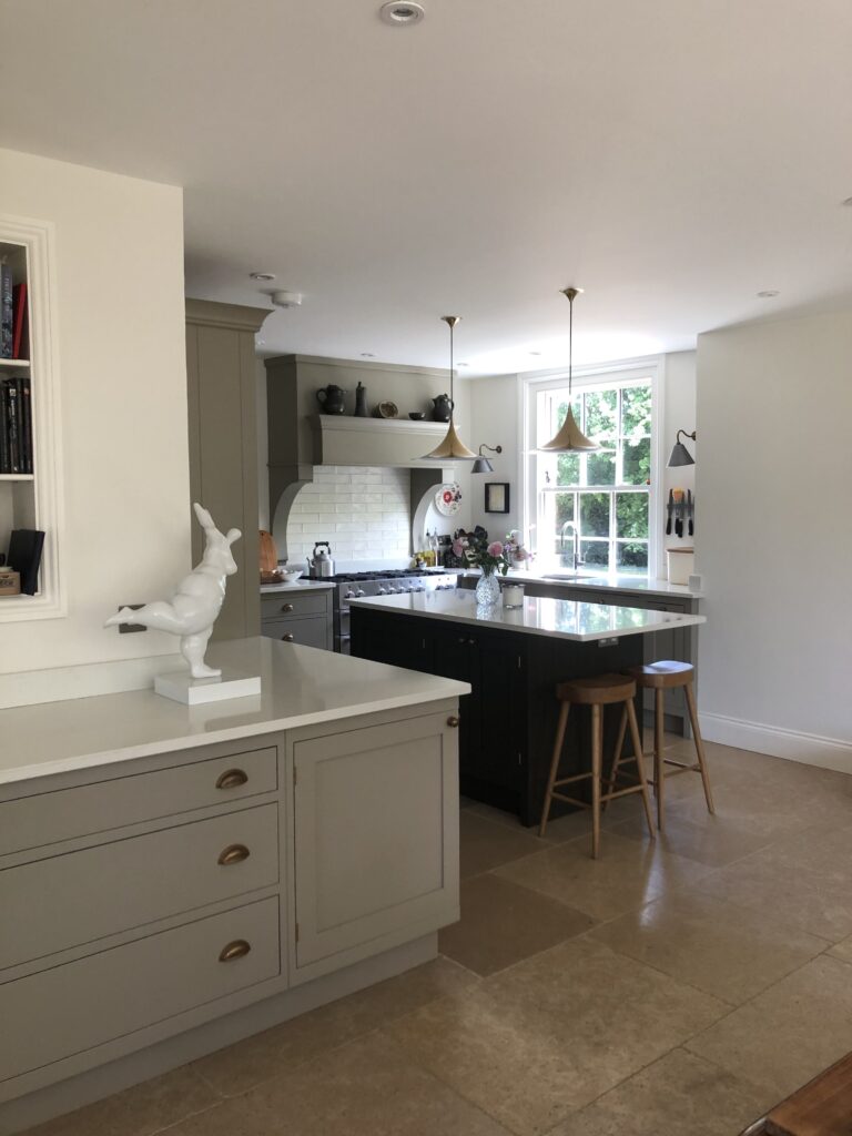 a kitchen with a table in a room