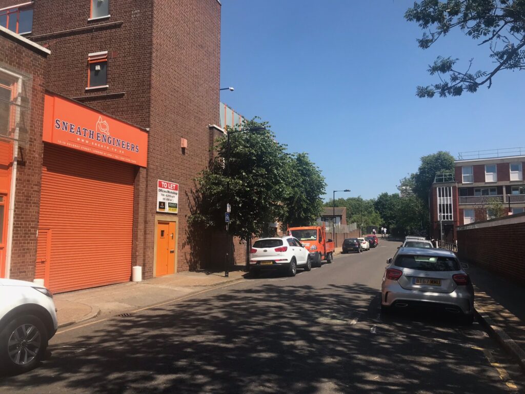 a car parked on the side of a building