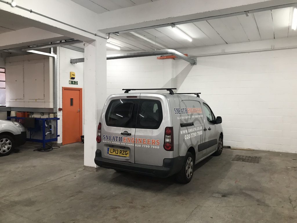 a truck is parked on the side of a building