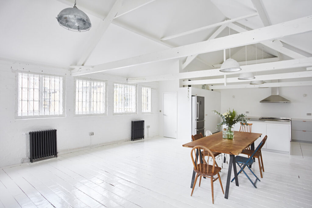 a large room with tables and chairs