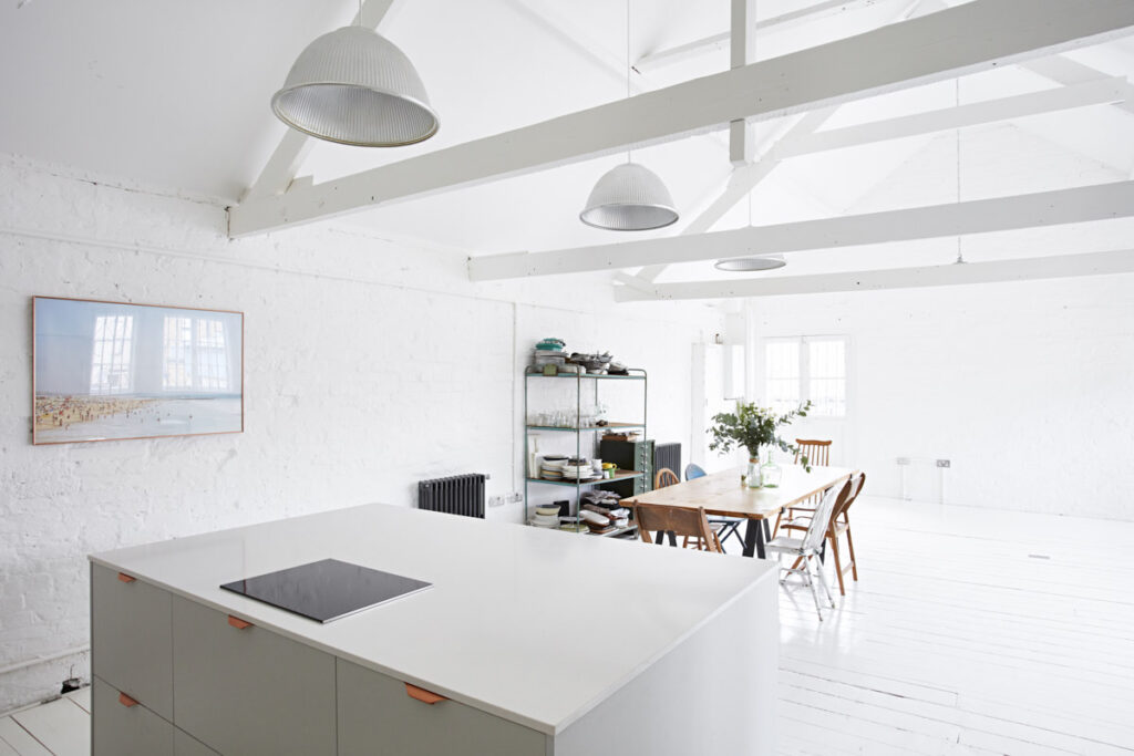 a kitchen with a table in a room