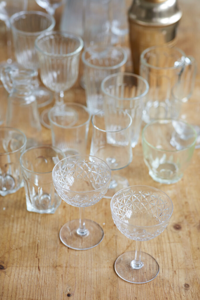 a table filled with wine glasses