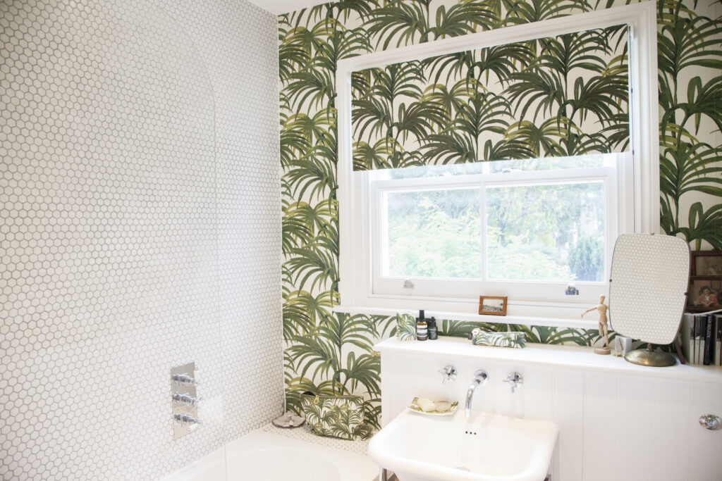 a sink sitting under a window
