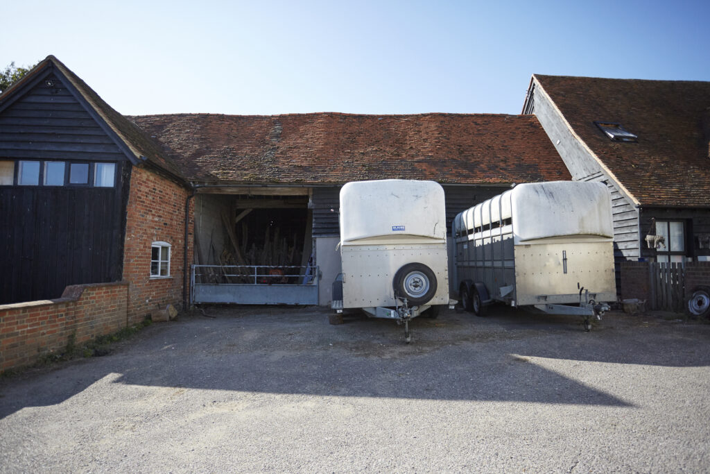 a truck is parked in front of a house
