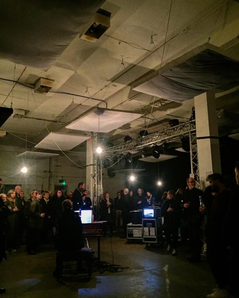 a group of people standing in a room