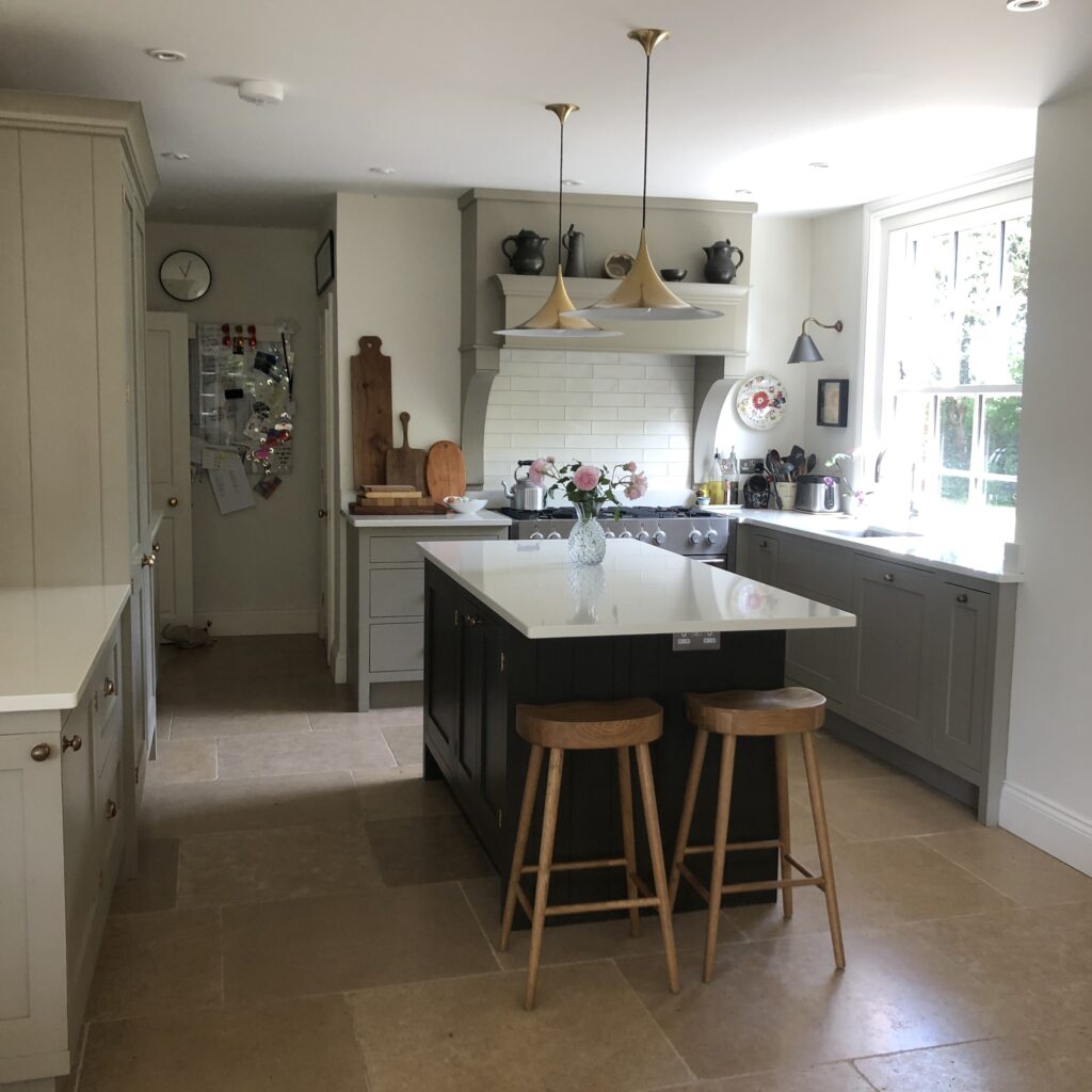 a kitchen with a dining room table