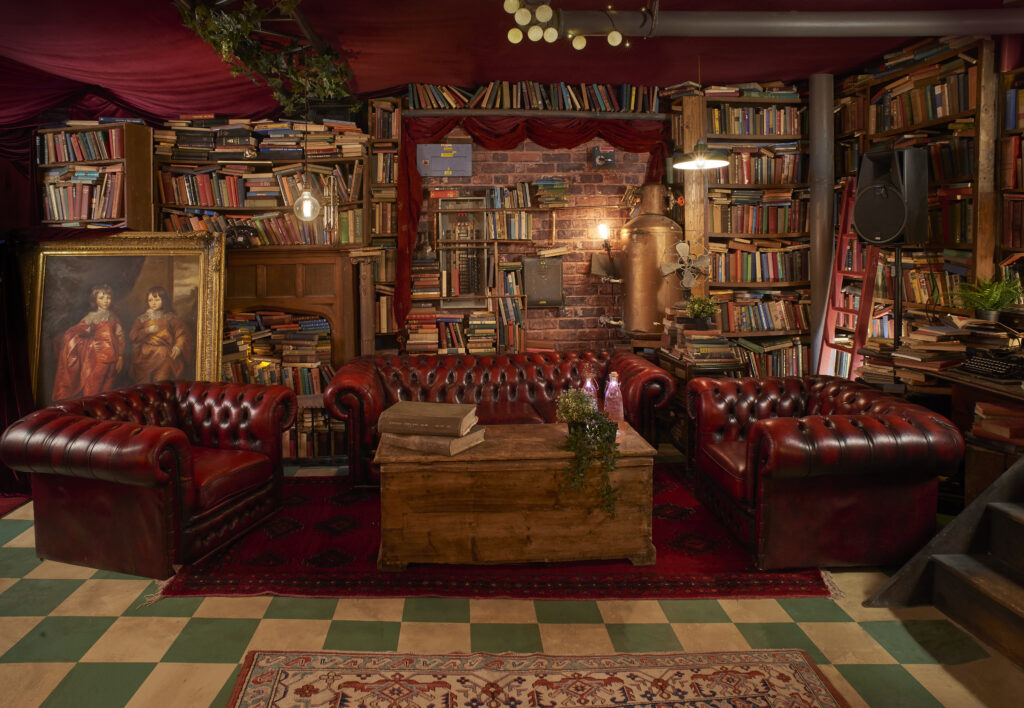 a living room filled with furniture and a rug