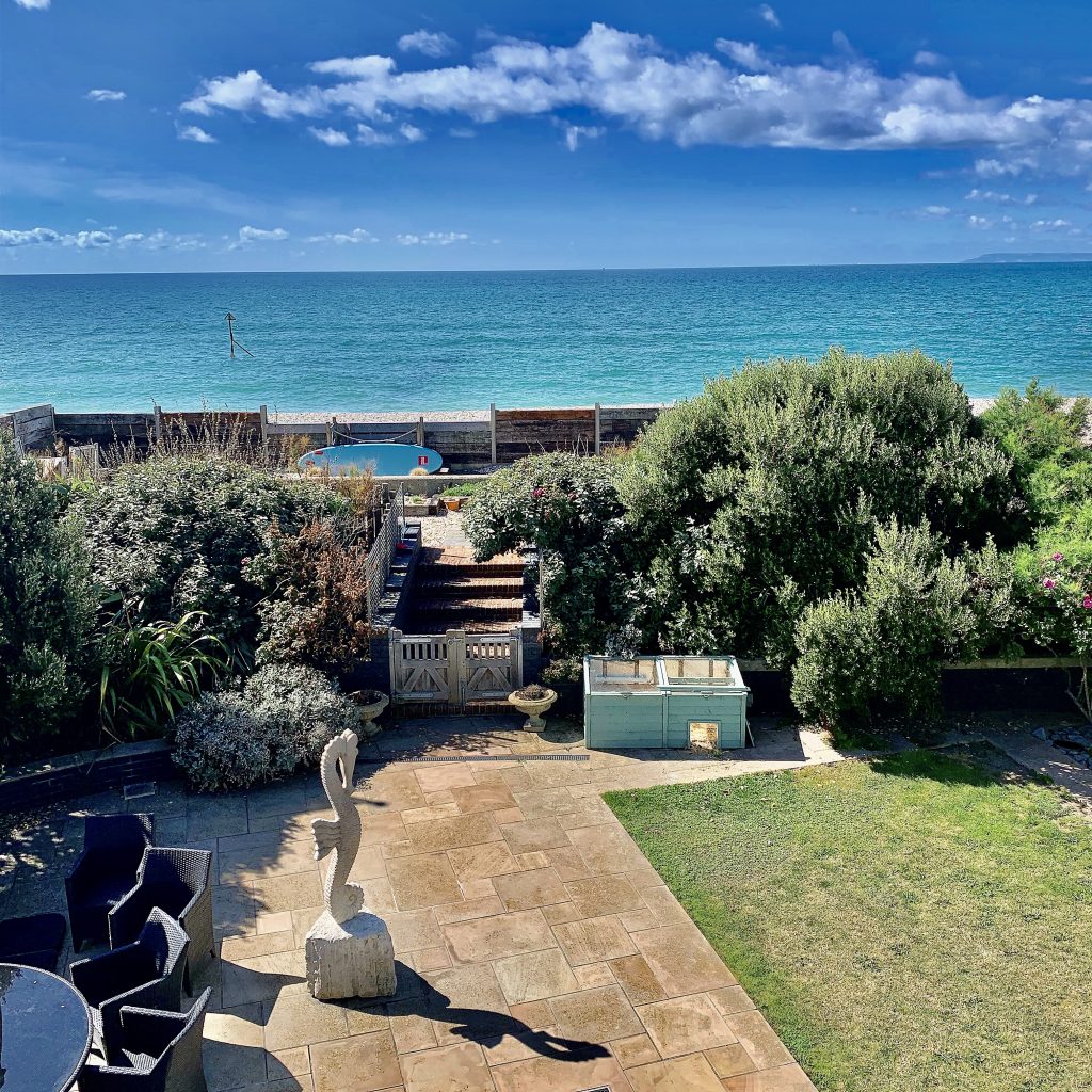 a view of a beach next to a body of water