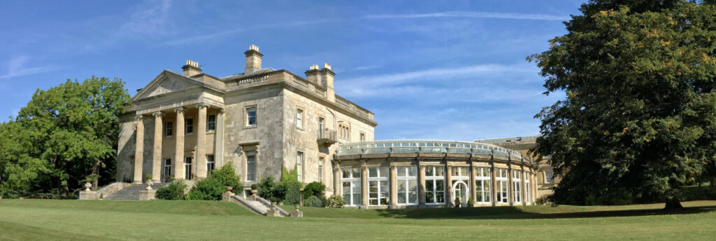 a large lawn in front of a building