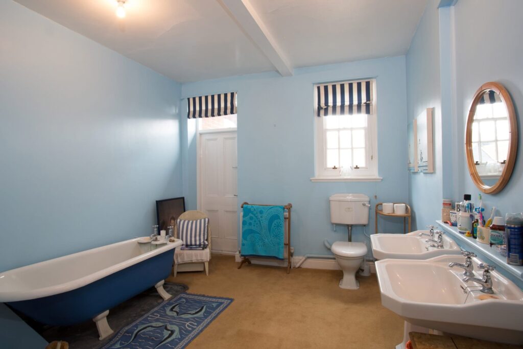 a room filled with furniture and a tub