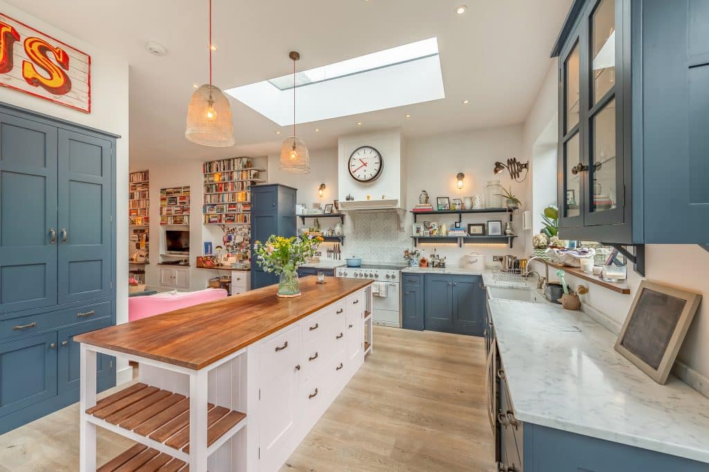 a kitchen with a table in a room
