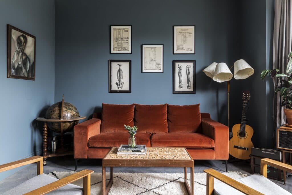a living room filled with furniture on top of a wooden chair