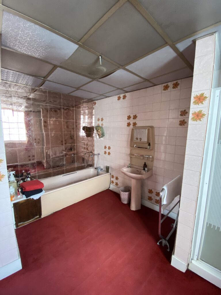 a kitchen with a sink and a bath tub