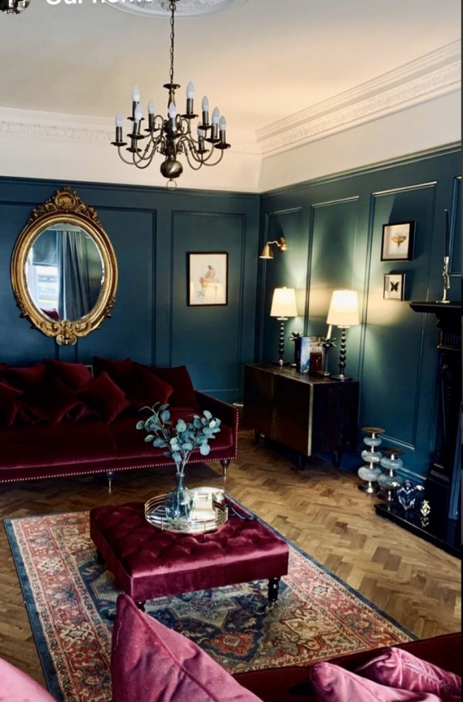 a living room with a large mirror