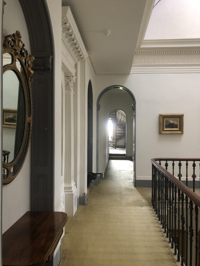 a room with a large mirror
