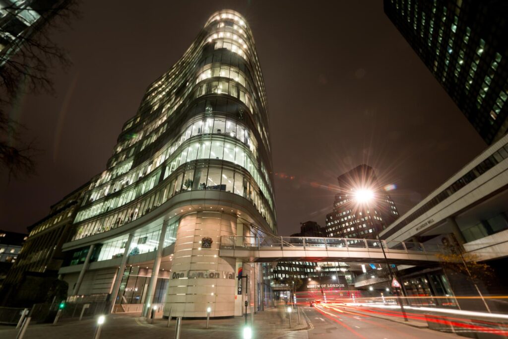a tall building lit up at night