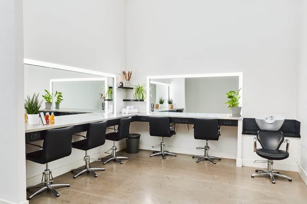 a room filled with furniture and a large window