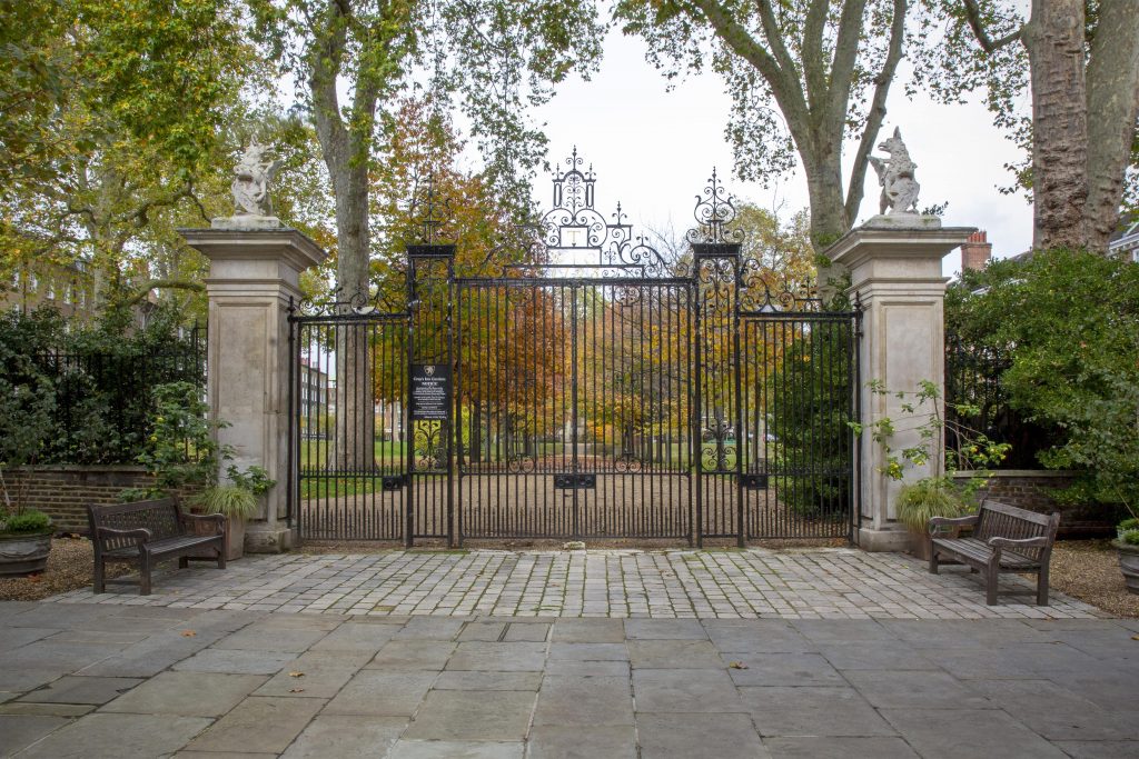a statue of a cement bench