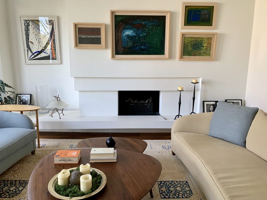 a living room with a couch and a table