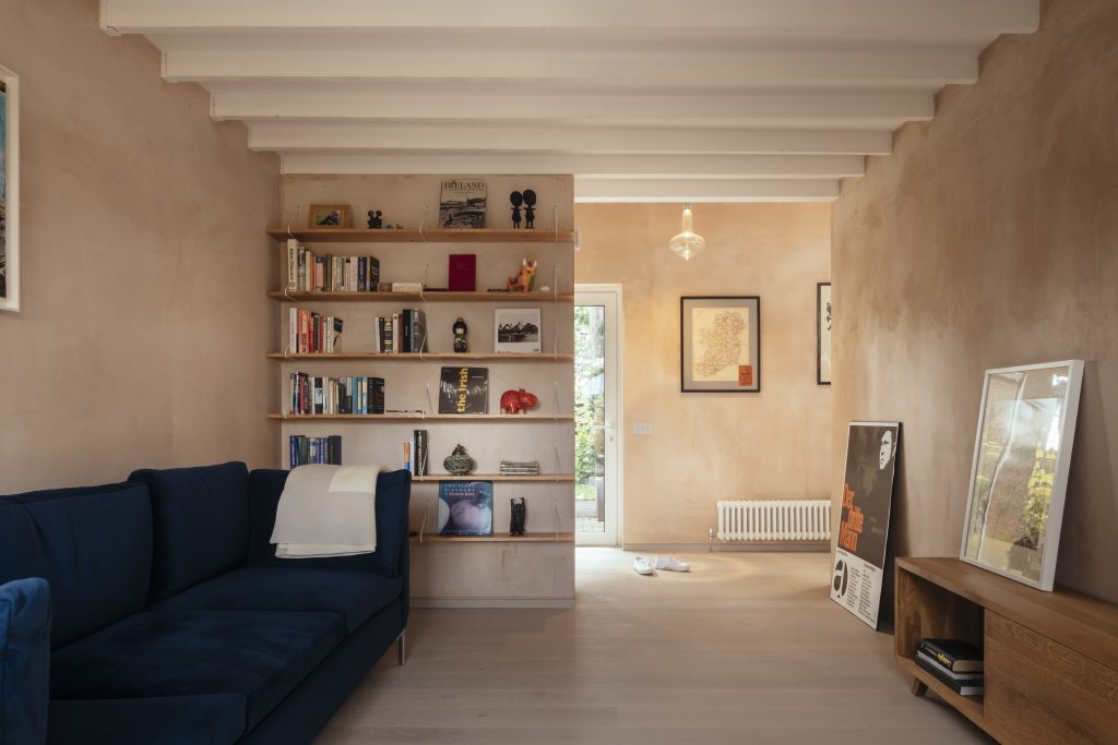 a living room filled with furniture and a fireplace