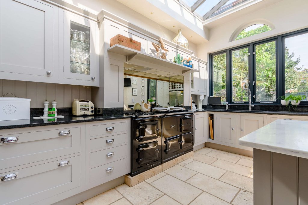 a kitchen with a sink and a window