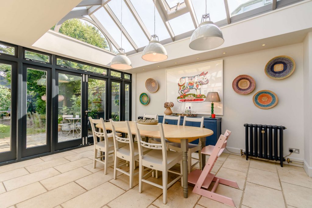 a dining room table in front of a building