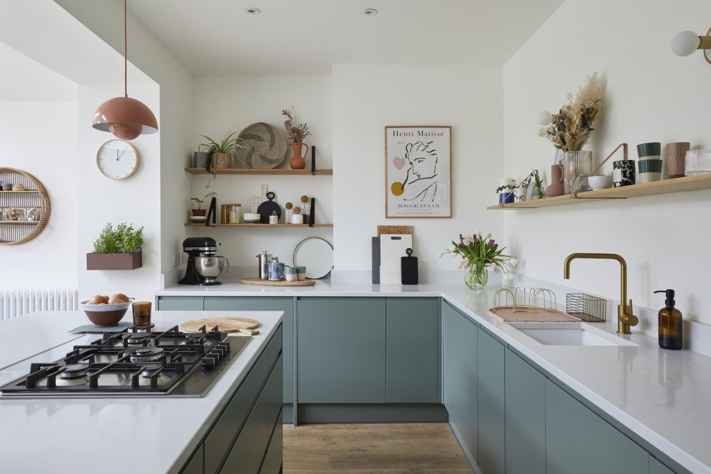 a kitchen with a stove and a sink