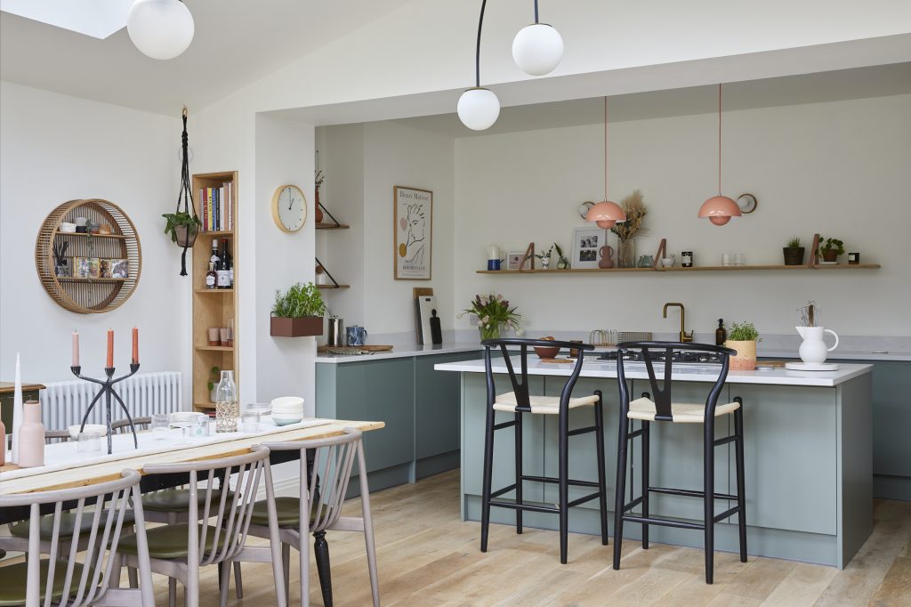 a kitchen with a dining room table