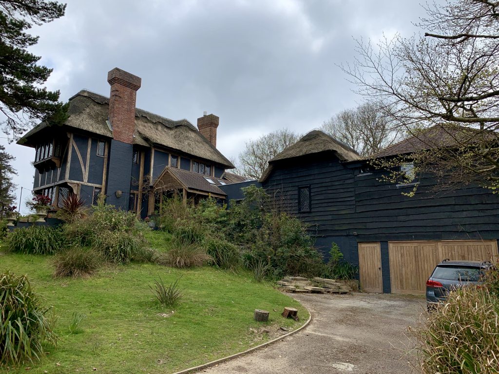 a house with trees in the background