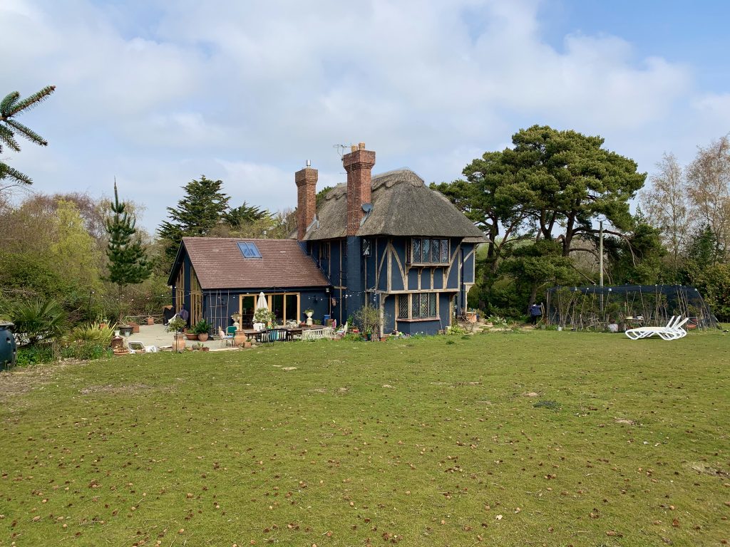 a house with a grass field