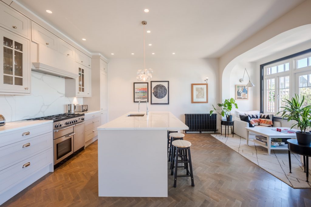 a kitchen with a table in a room