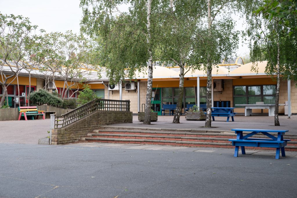 a bench in front of a house
