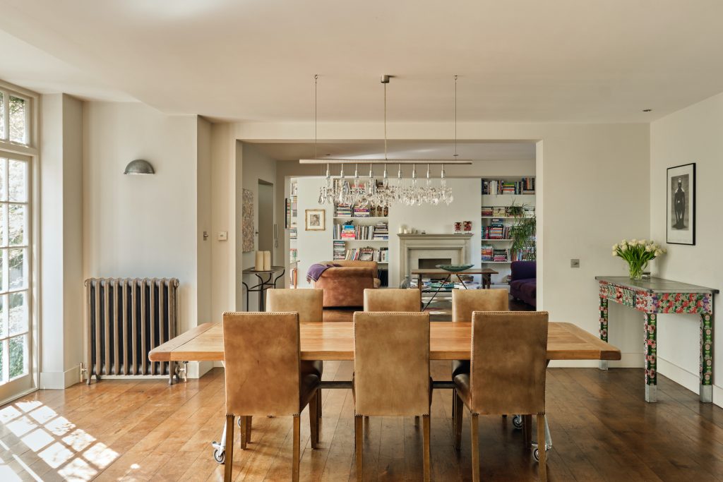a living room filled with furniture and a fire place