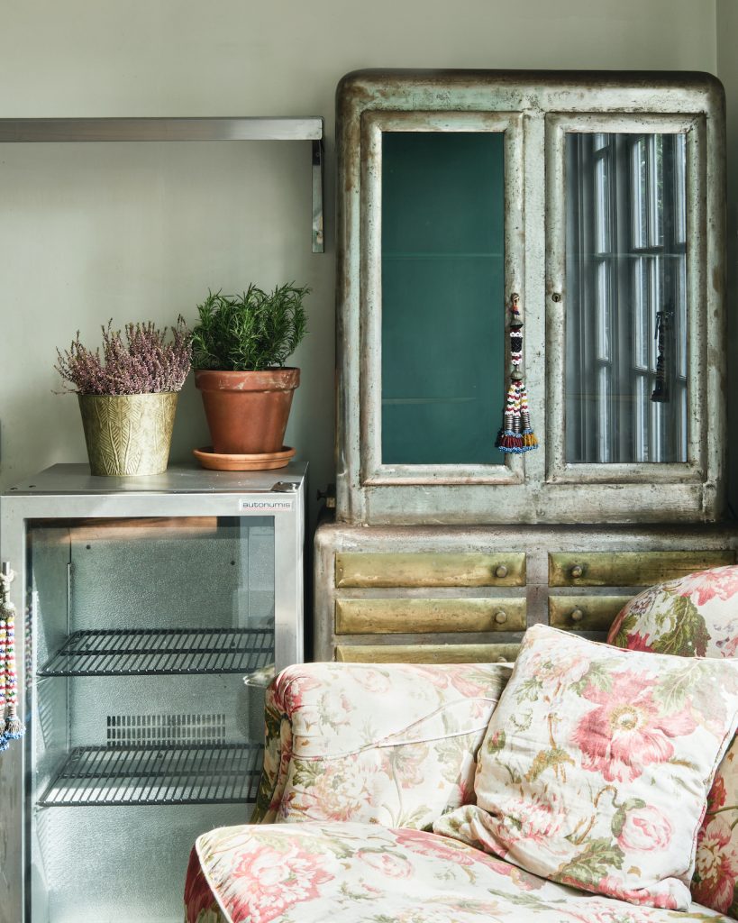 a room filled with furniture and a large window