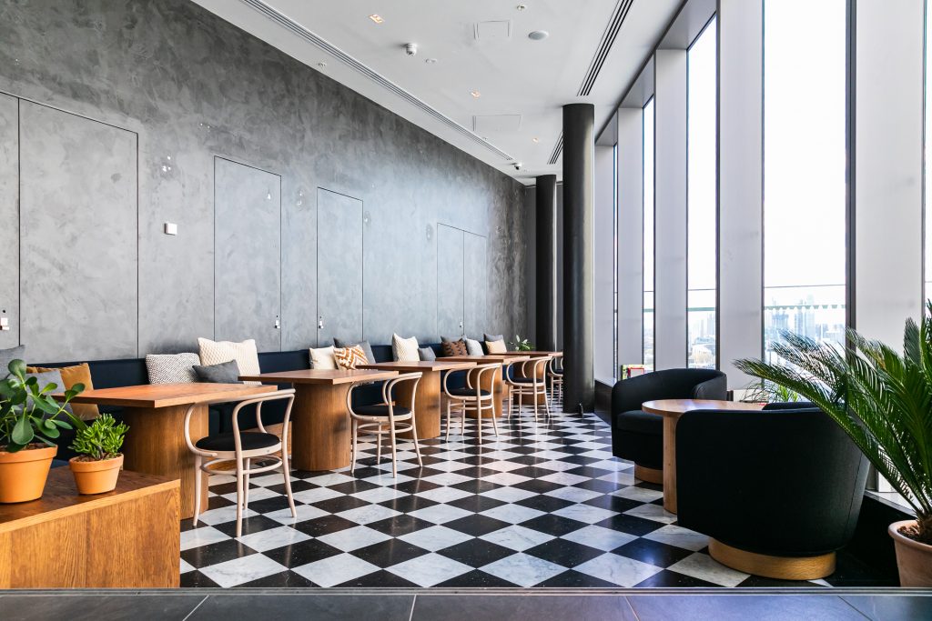 a dining room table in front of a building